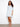 Light blue Henley shirt dress with chest pocket and 3/4 sleeves, offering a relaxed fit by Charlie B.