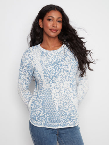 Elegant patterned sweater featuring a classic crew neckline, crafted from 100% cotton for ultimate comfort. By Charlie B.