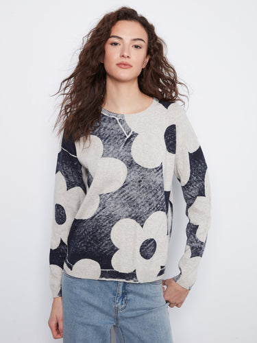 Navy and white graphic print sweater with a crew neckline, featuring drop shoulders for a relaxed fit by Charlie B.