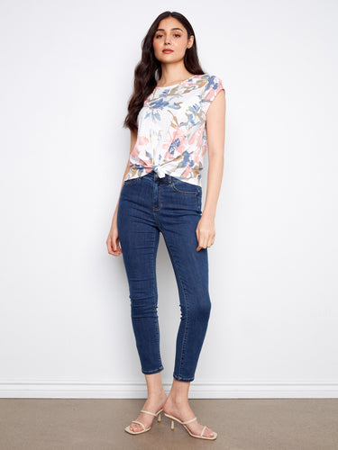 Elegant floral top crafted from 100% cotton, showcasing a stylish crew neckline and cap sleeves by Charlie B.