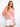 Model in a floral cotton gauze blouse with short dolman sleeves, adding a breezy touch to the look by Charlie B.