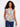 Chic floral top with a Henley neckline, showcasing vibrant colors and a relaxed fit for effortless style by Charlie B.