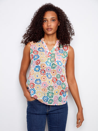 Chic floral top with a Henley neckline, showcasing vibrant colors and a relaxed fit for effortless style by Charlie B.