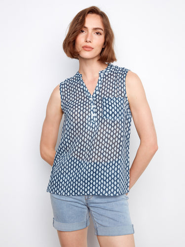 Geometric print blouse with a stylish Henley neckline, featuring a half-button front for versatile wear by Charlie B.