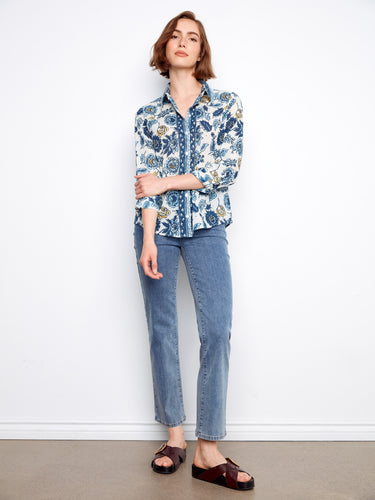Stylish button-up closure on this floral shirt adds a touch of elegance to any ensemble. Ideal for layering or wearing alone by Charlie B.