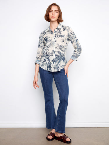 Stylish button-up closure on this lightweight cotton shirt, offering both comfort and sophistication. Designed by Charlie B.