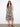 Abstract print midi dress with hidden pockets and a stylish V-neckline by Charlie B.