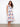 Floral dress featuring a stylish V-neck design, perfect for a casual day out or a special occasion. By Charlie B.