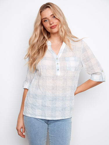 Plaid blouse featuring a chest pocket and roll-up sleeves, perfect for casual wear by Charlie B.