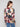 Floral patterned sweater designed with zipper details on the sleeves for added flair by Charlie B.