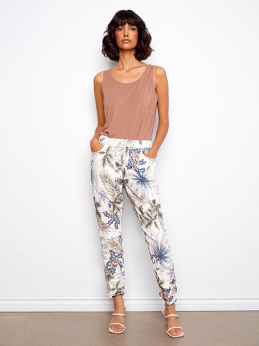 Women's jogger pants with a vibrant floral print, showcasing a slim fit and regular rise for a chic look by Charlie B.