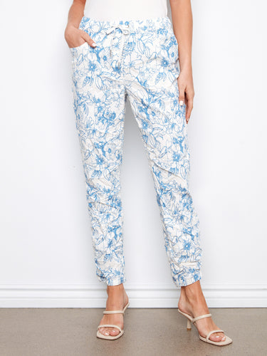 These pants showcase a regular rise and stretch fabric, providing ease of movement and style in a beautiful floral design by Charlie B.