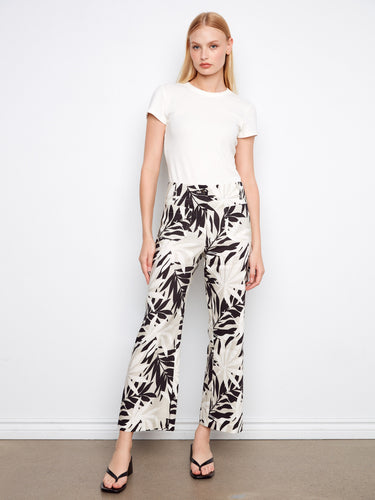 Wide-leg pants in a striking black and white leaf pattern, crafted from a stretch linen blend by Charlie B.