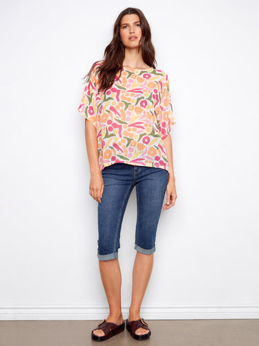 Colorful blouse with elbow-length dolman sleeves in a breathable fabric by Charlie B.