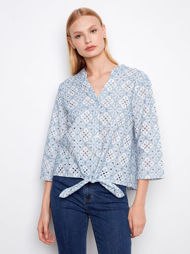 Blue eyelet cotton blouse featuring a Henley neckline and intricate embroidered pattern, perfect for casual elegance by Charlie B.