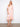Elegant dress featuring a V-neckline and self-tie belt, perfect for any occasion. Designed by Charlie B.