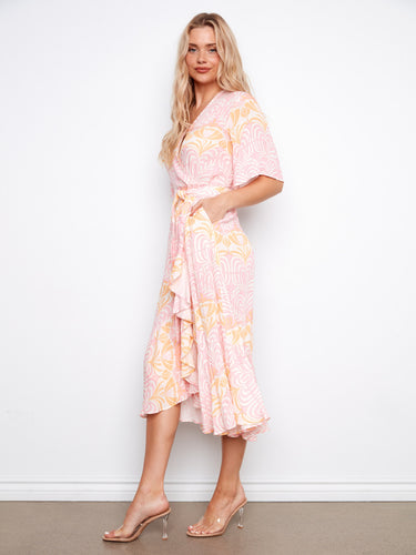 Maxi dress with a self-tie belt and V-neck, offering both style and comfort for your wardrobe. By Charlie B.