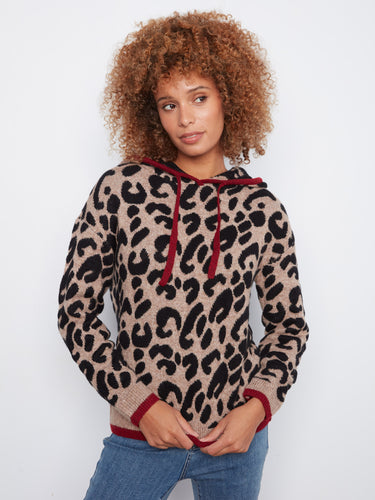 The design includes contrast trims that add an extra touch of style and sophistication to the overall look. By Charlie B.