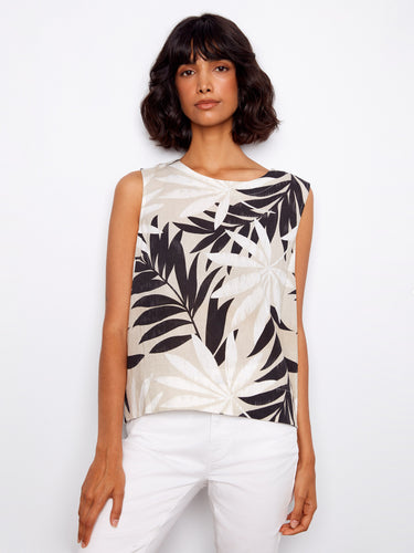 Tropical print top with a crew neckline, perfect for casual outings. Its relaxed fit offers comfort and style. By Charlie B.