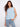 Elegant top with a crew neckline, showcasing a floral pattern in soft blue and white hues. Perfect for casual wear by Charlie B.