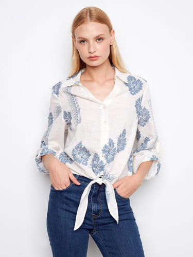 Stylish blouse with a Johnny neckline, showcasing a chic pattern and elegant design for versatile wear. By Charlie B.