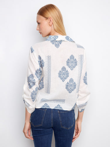 Elegant blouse with front-tie design, adding a trendy touch to your outfit while maintaining comfort. By Charlie B.
