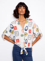 Blouse with postcard print featuring a V-neck and tie-front, perfect for casual days by Charlie B.