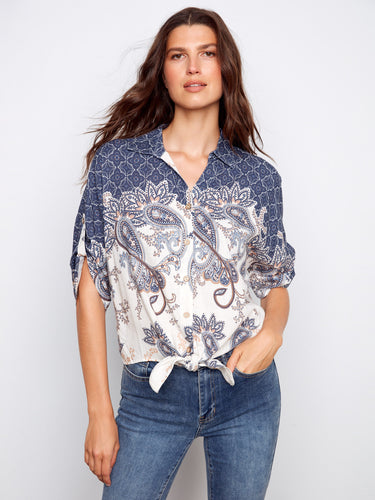 Elegant V-neck blouse featuring a chic button-up style and intricate paisley design, perfect for any occasion by Charlie B.