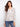 Paisley print blouse with crochet trim, featuring a notch neckline for added style by Charlie B.