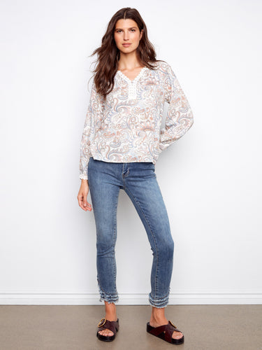 Elegant raglan sleeve blouse with intricate paisley design and crochet cuffs by Charlie B.