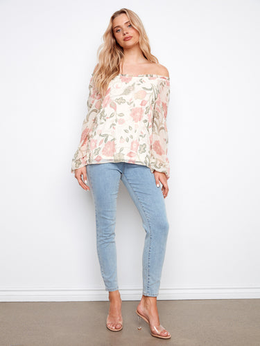 Elegant floral top featuring elastic cuffs that enhance the relaxed fit, ideal for casual outings by Charlie B.
