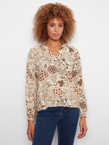 Floral blouse with a stylish notch neckline, crafted from soft viscose fabric for ultimate comfort. By Charlie B.