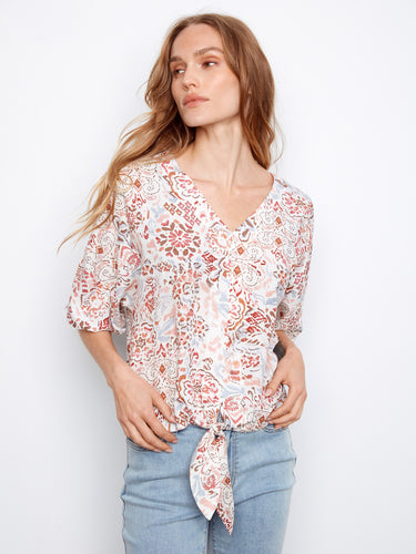 Women's printed blouse with a stylish V-neck and intricate patterns, perfect for casual outings by Charlie B.
