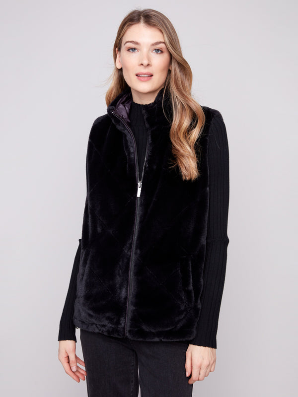Elegant faux fur vest with a practical reversible design, showcasing plush texture by Charlie B.