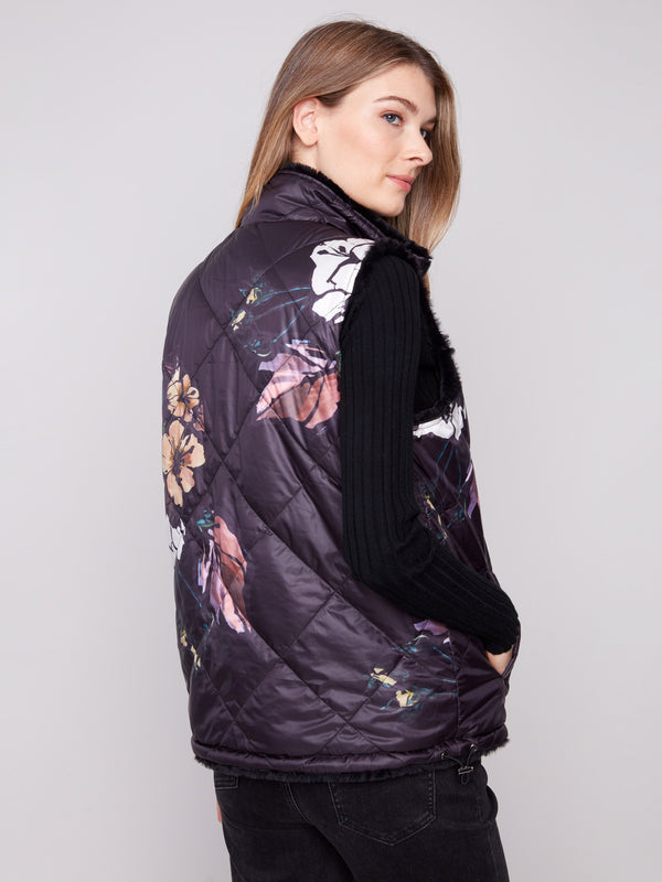 Chic floral quilted vest boasting an easy-to-use zipper front closure by Charlie B.