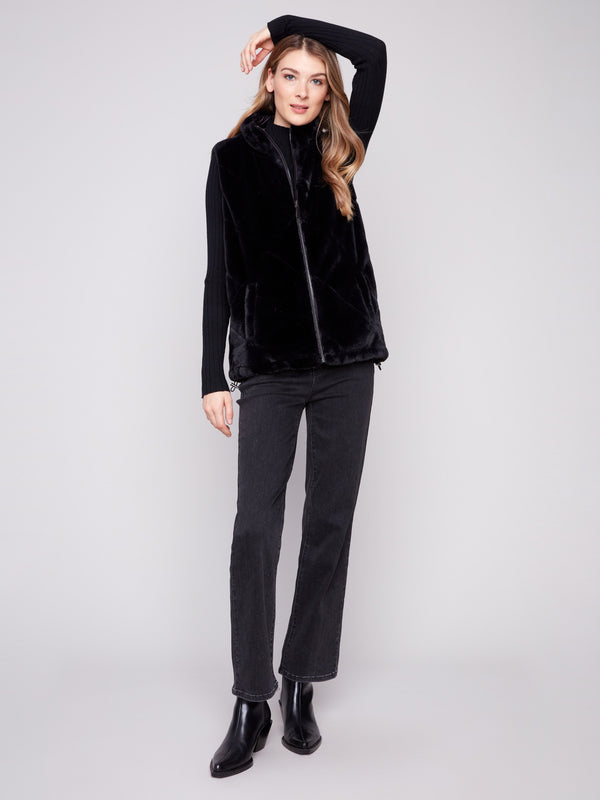 Luxurious faux fur side of the reversible vest, complete with functional welt pockets by Charlie B.