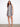 Elegant dress with a crew neckline, showcasing a bold pattern and crafted for comfort. Perfect for any occasion by Charlie B.