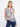Abstract print top with a sleeveless design and a ruffle neckline, adding elegance to any outfit by Charlie B.