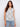 V-neck sleeveless top featuring a delicate gardenia floral print in a lightweight fabric by Charlie B.
