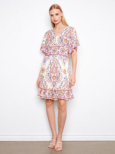 Dress with abstract patterns and a smocked back waist, featuring flutter sleeves and a V-neck by Charlie B.