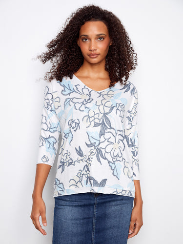 Elegant V-neck top with 3/4 sleeves and a charming floral print, perfect for casual outings. By Charlie B.