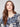 Sweater with a plushy yarn texture and colorful floral pattern, crafted to highlight its elegant V-neckline by Charlie B.