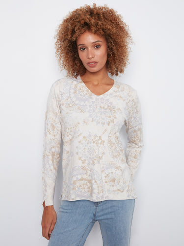 Sweater with side slits at cuffs and hem, featuring a delicate abstract print in soft hues by Charlie B.