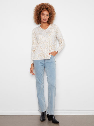 Relaxed fit V-neck sweater showcasing an elegant pattern in muted tones by Charlie B.