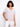 Heart-patterned T-shirt featuring a stylish V-neckline and short sleeves by Charlie B.