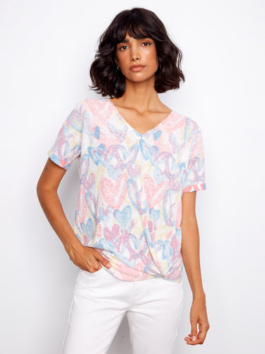 Heart-patterned T-shirt featuring a stylish V-neckline and short sleeves by Charlie B.