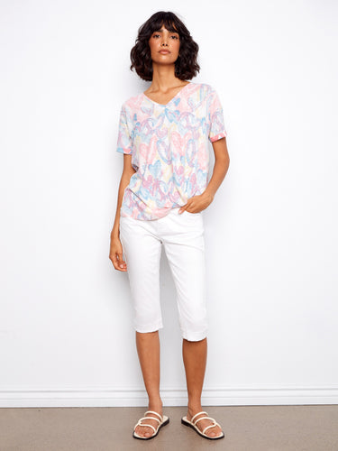 Vibrant heart-printed T-shirt with charming short sleeves by Charlie B.