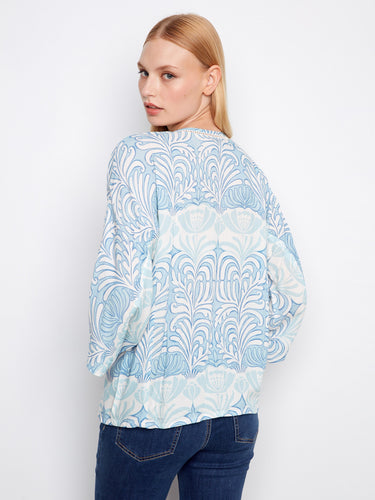 Adorned with ladder stitch detail, this top brings a touch of sophistication to your wardrobe. Ideal for versatile styling by Charlie B.