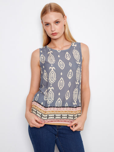 Black and white abstract print top, highlighted by its elegant keyhole back design for added flair by Charlie B.