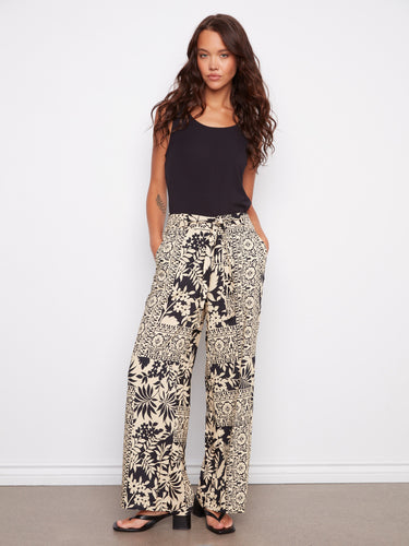These pants feature a wide leg design, adding a flowy and relaxed look to your outfit. By Charlie B.